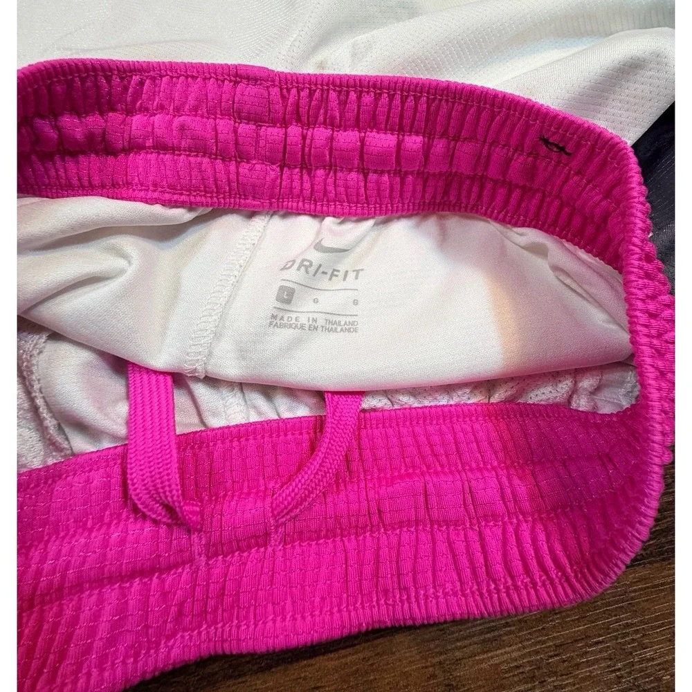 Youth dri-fit Nike Elite basketball shorts pink and white.  Size large.  Unisex